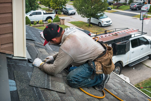 Professional Roofing technician working in Weare, NH